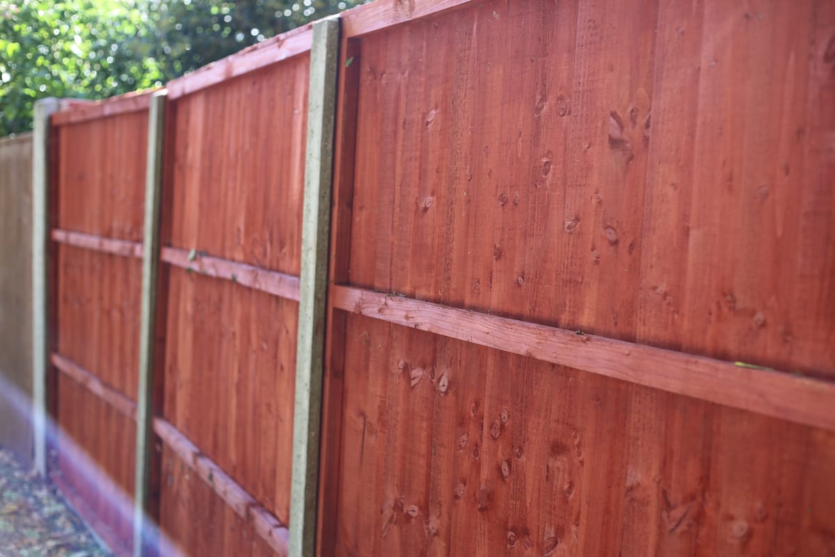 Stained fence panel